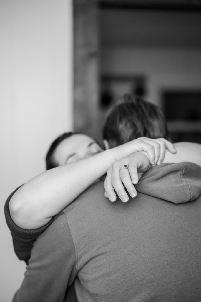 Greensboro Birth Photographer - Husband supports laboring wife in slow dance poser